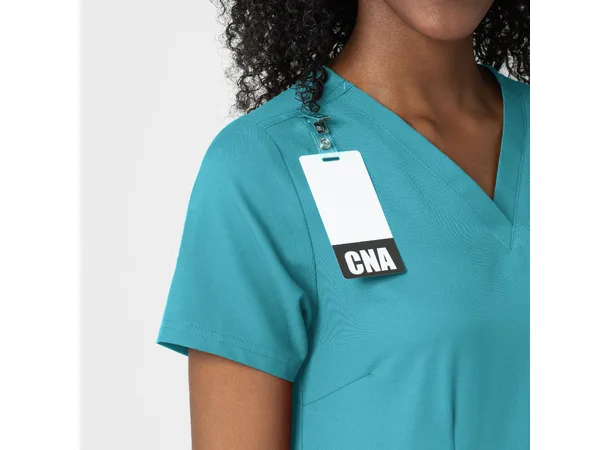 Thrive Dametunika med frontlommer Teal Blue S 