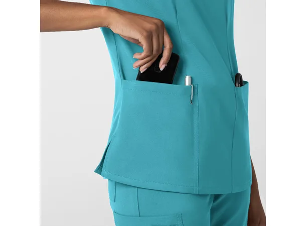 Thrive Dametunika med frontlommer Teal Blue S 