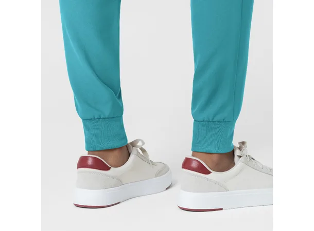 Thrive Damebukse med strikk i ben Teal Blue L 